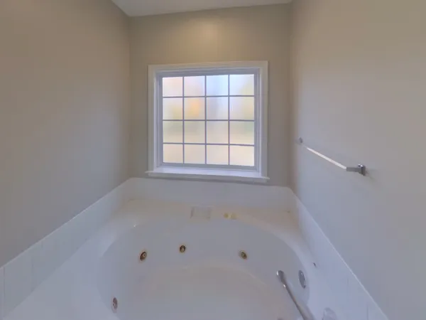 a view of a bathtub in a room