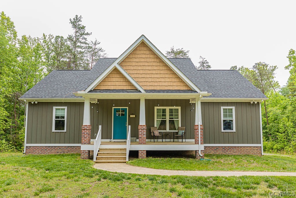 4111 Cedar Plains Road Sandy Hook, VA 23153 - Photo 1 of 28 a view of a house with a yard and sitting area