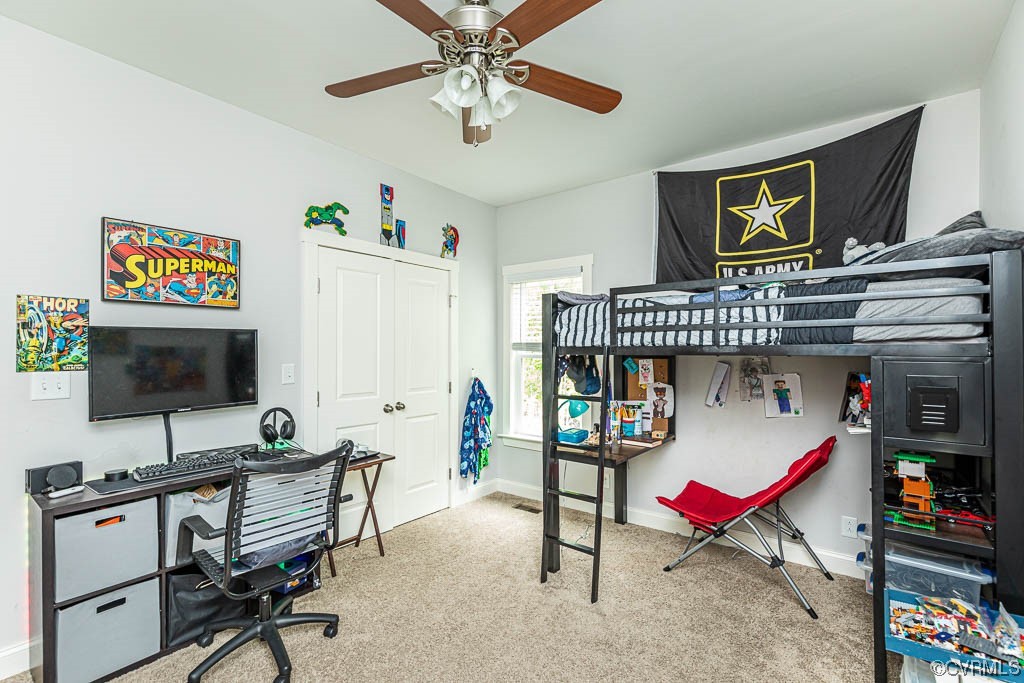 4111 Cedar Plains Road Sandy Hook, VA 23153 - Photo 17 of 28 a living room with furniture a flat screen tv and a window