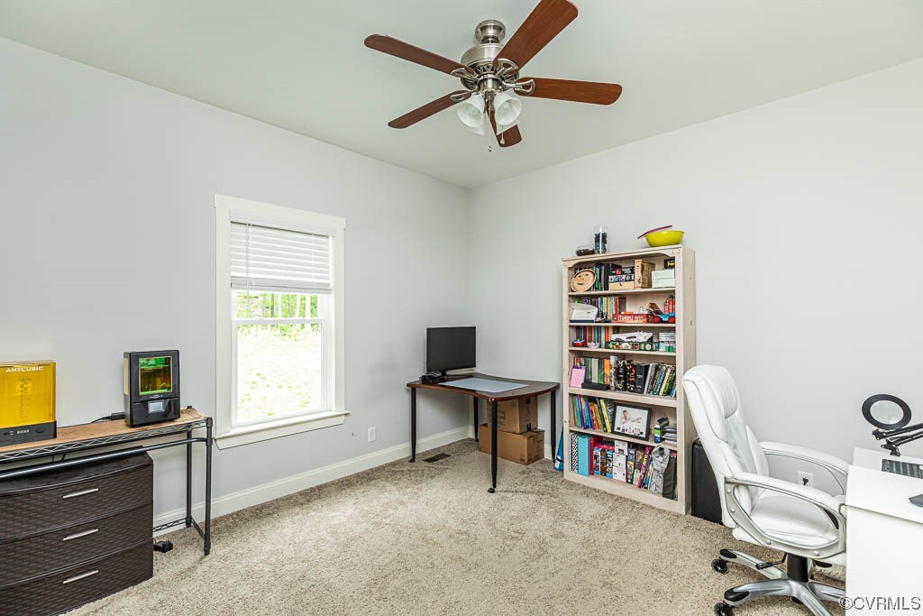 4111 Cedar Plains Road Sandy Hook, VA 23153 - Photo 19 of 28 a view of a workspace with furniture and a window