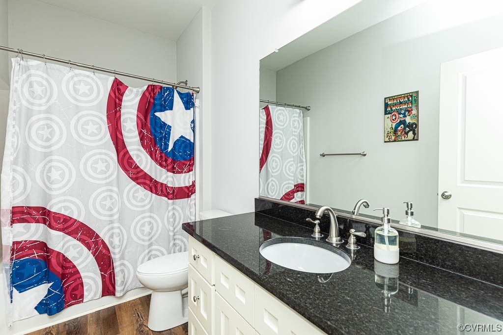 4111 Cedar Plains Road Sandy Hook, VA 23153 - Photo 20 of 28 a bathroom with a sink and a mirror