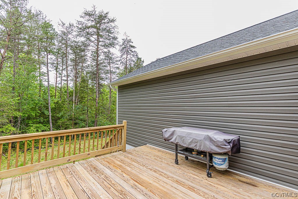 4111 Cedar Plains Road Sandy Hook, VA 23153 - Photo 22 of 28 a view of a two chairs on the deck