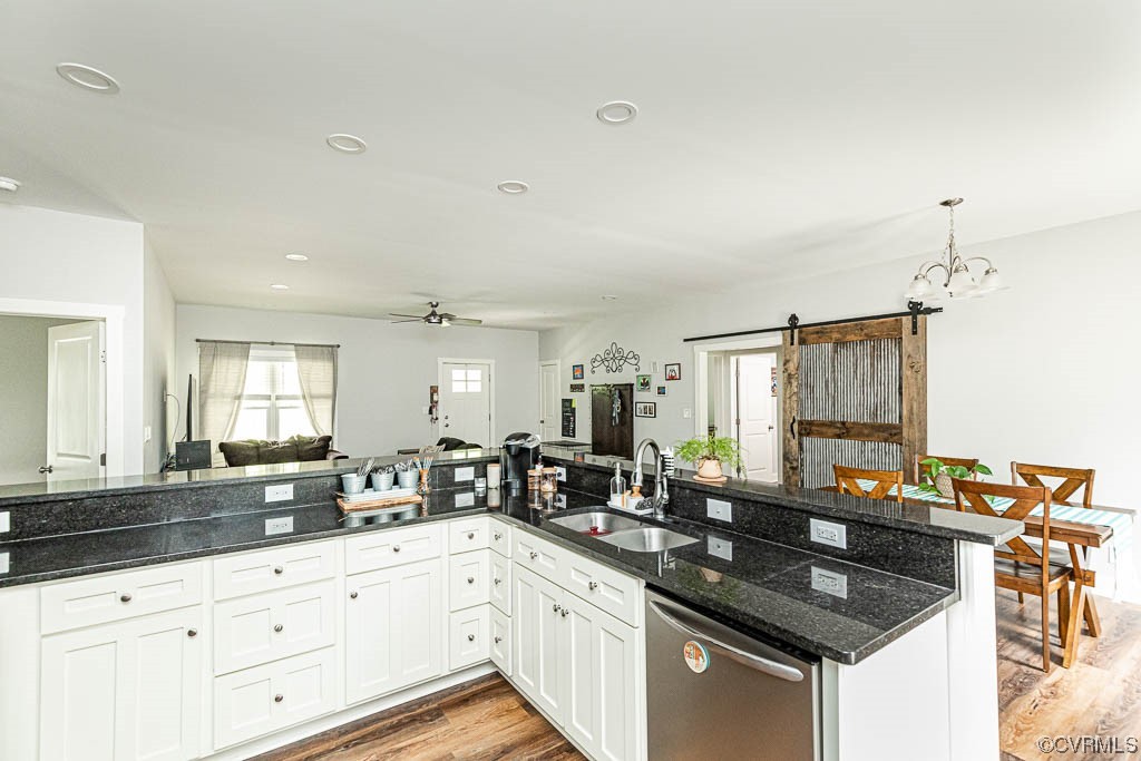 4111 Cedar Plains Road Sandy Hook, VA 23153 - Photo 7 of 28 a kitchen with granite countertop a sink counter top space and cabinets