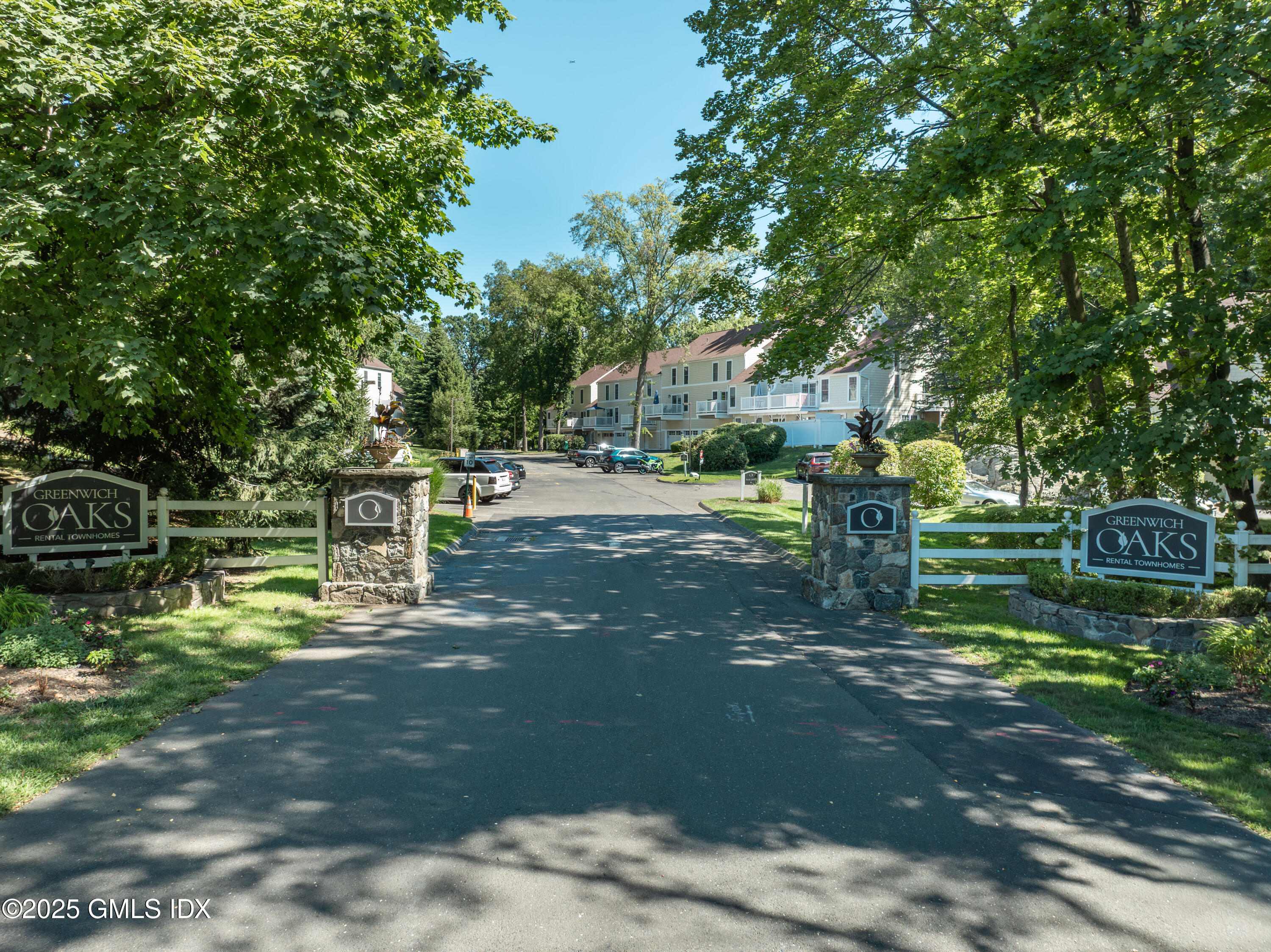 251 Weaver Street, Unit 1C Greenwich, CT 06831 - Photo 29 of 29 a view of a park with large trees
