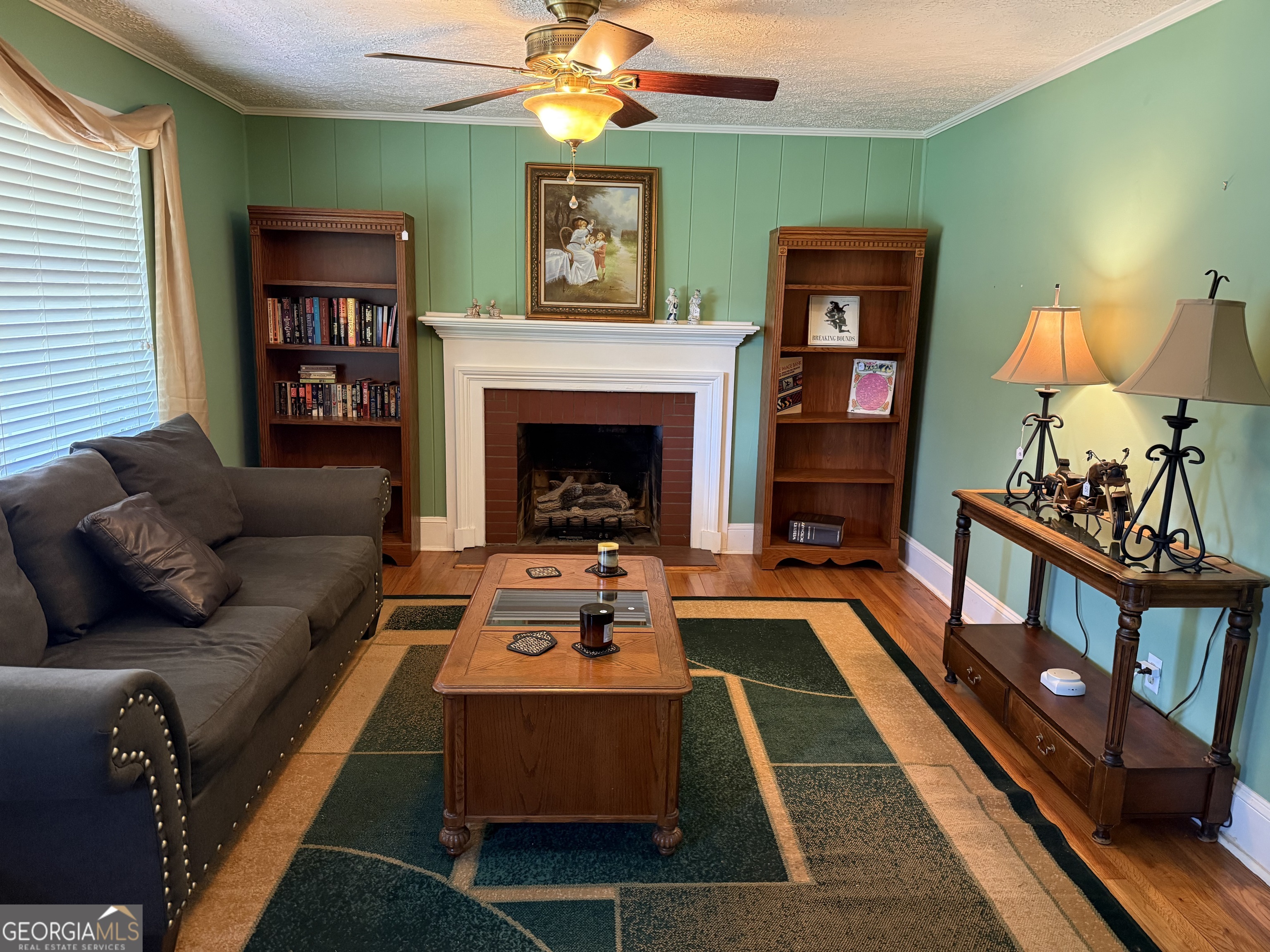 1591 Waymanville Road Thomaston, GA 30286 - Photo 10 of 24 a living room with furniture and a fireplace