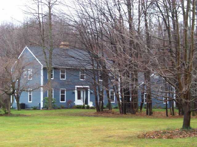 17300 Taylor Road Clarendon, NY 14470 - Photo 1 of 1 Exterior Front. Front Exterior. Nestled in the Woo