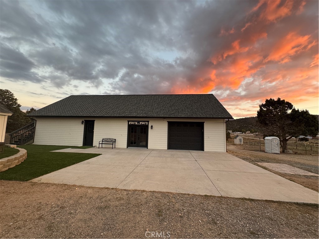 a front view of a house with yard