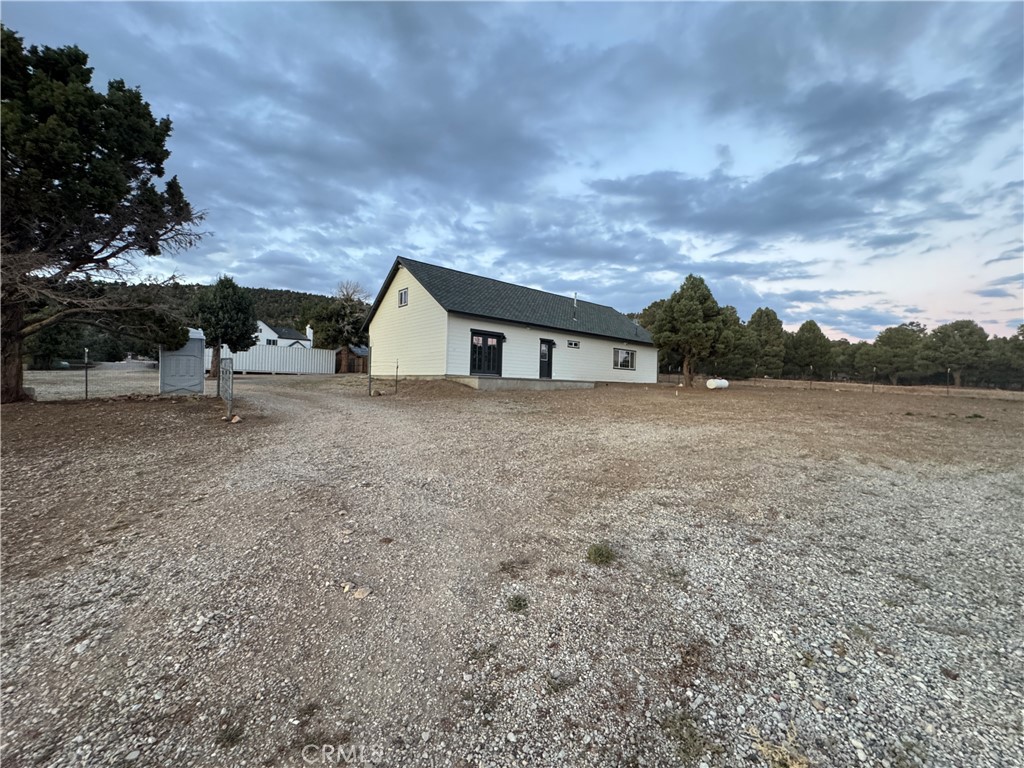 46685 Benito Wilson Road, Unit ADU Big Bear City, CA 92314 - Photo 3 of 19 a view of a house with a yard