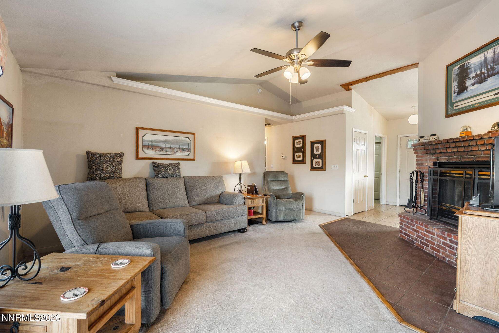 219 David Avenue Stagecoach, NV 89429 - Photo 11 of 40 a living room with furniture and a fireplace