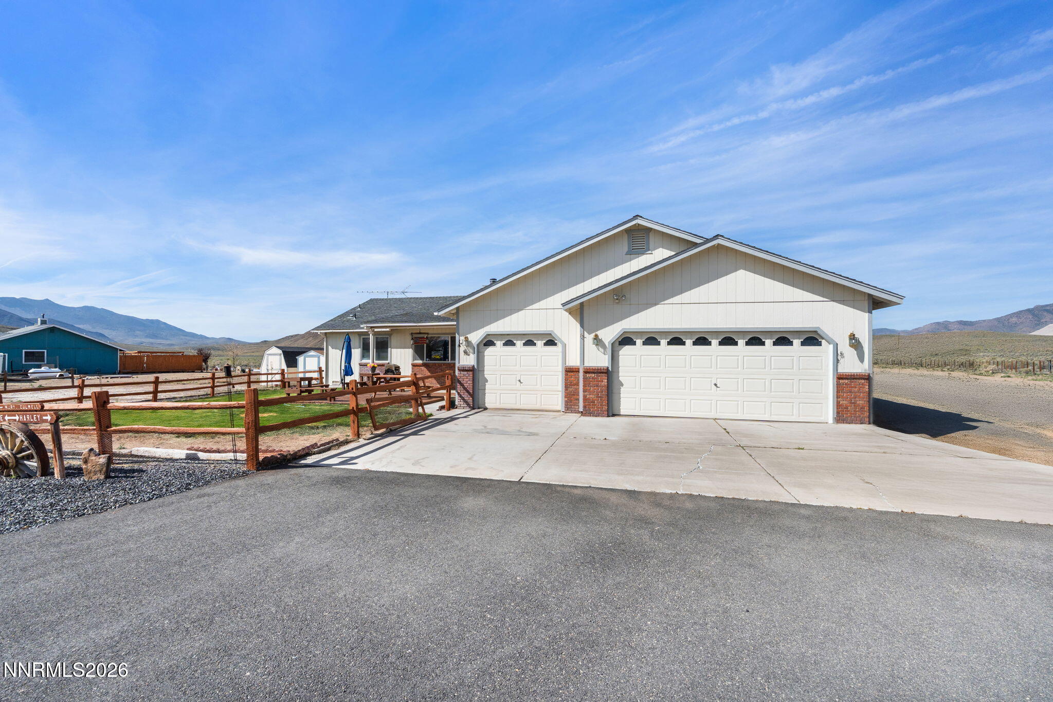 219 David Avenue Stagecoach, NV 89429 - Photo 25 of 40 a view of garage with a car park in front of it