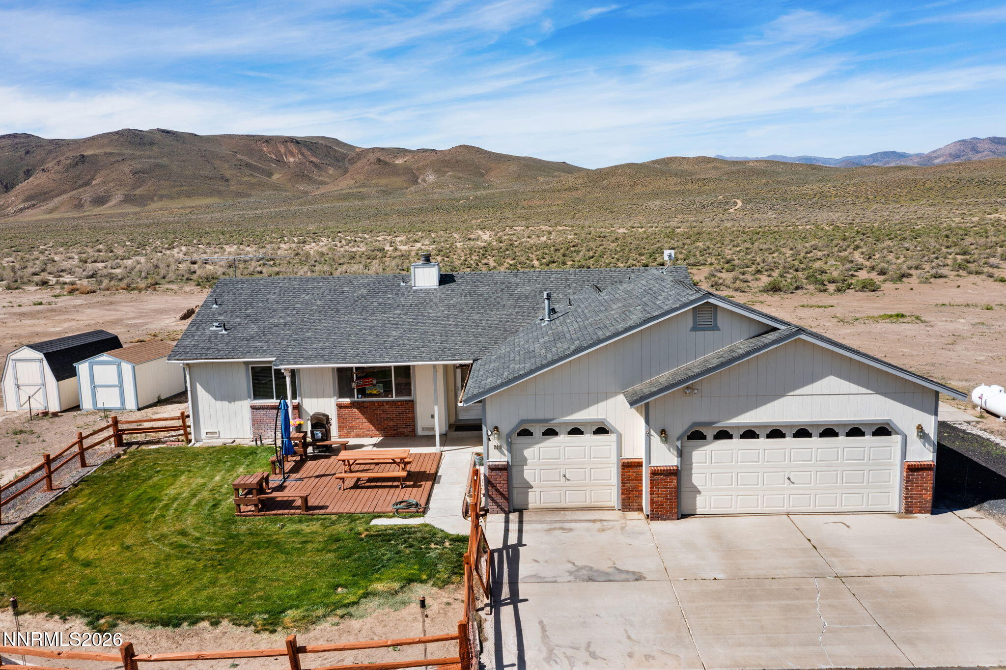 219 David Avenue Stagecoach, NV 89429 - Photo 29 of 40 a view of a terrace with a garden and mountain view