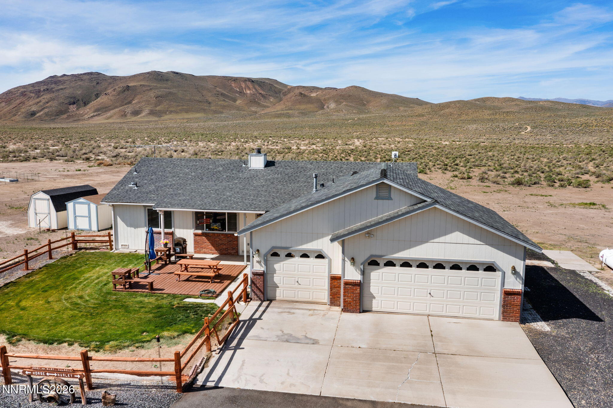 219 David Avenue Stagecoach, NV 89429 - Photo 33 of 40 a view of a terrace with a garden and mountain view