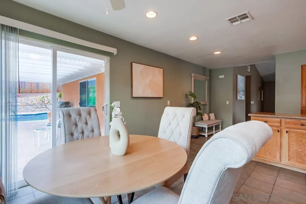 14230 Match Point Drive Poway, CA 92064 - Photo 16 of 70 a view of a dining room with furniture
