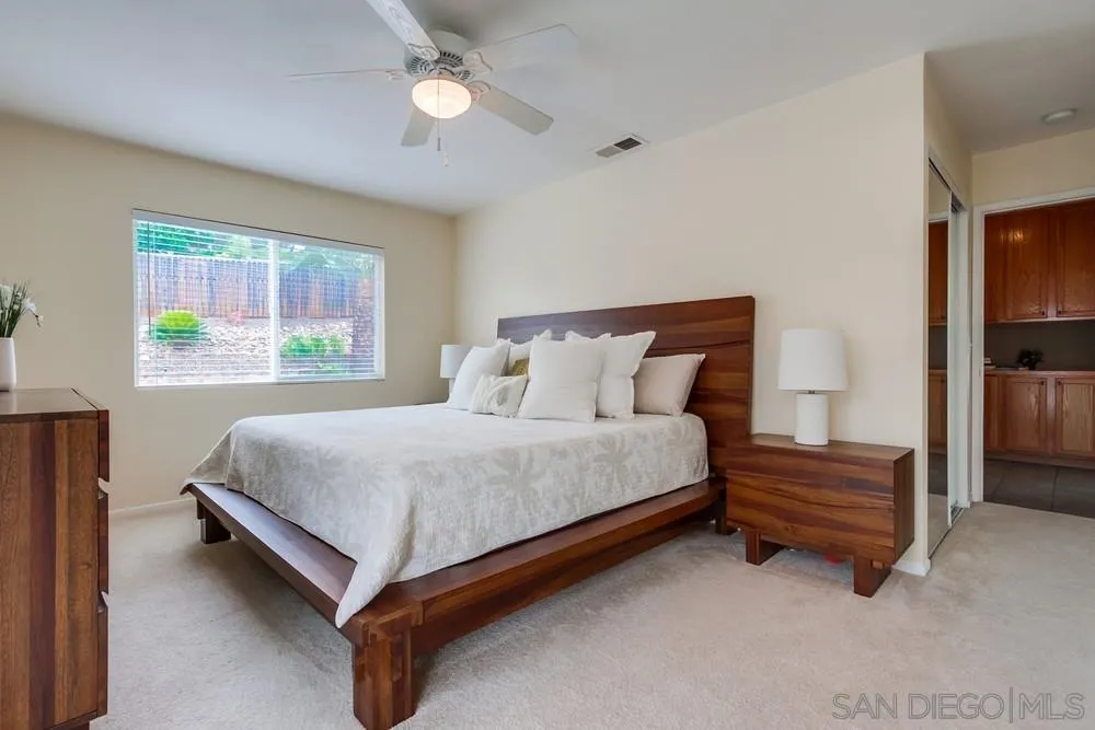 14230 Match Point Drive Poway, CA 92064 - Photo 18 of 70 a bedroom with a bed and window