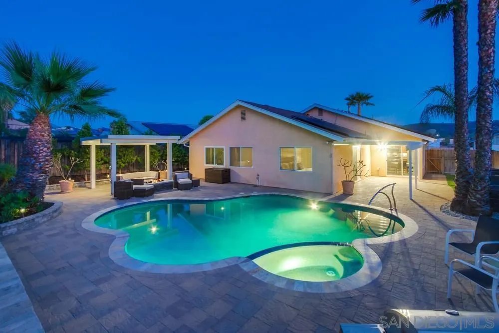 14230 Match Point Drive Poway, CA 92064 - Photo 2 of 70 a view of a house with swimming pool