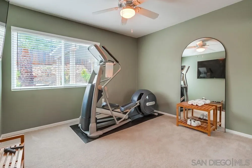 14230 Match Point Drive Poway, CA 92064 - Photo 24 of 70 a room with gym equipment and a large window