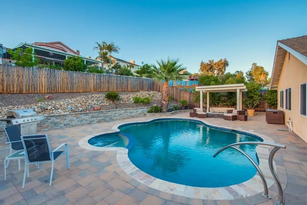 14230 Match Point Drive Poway, CA 92064 - Photo 48 of 70 a swimming pool with outdoor seating and yard