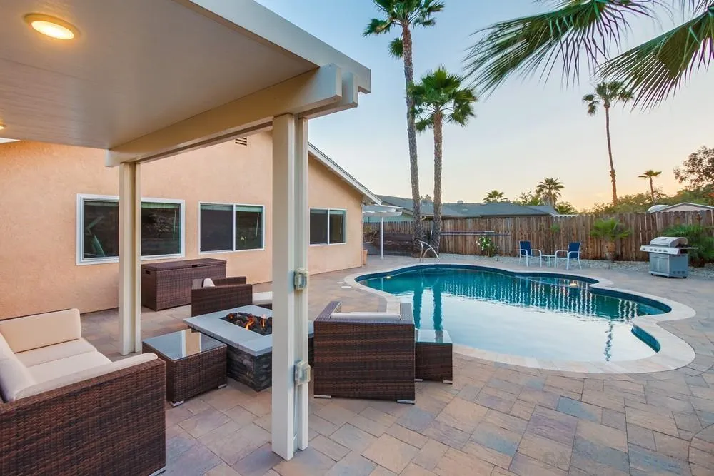 14230 Match Point Drive Poway, CA 92064 - Photo 54 of 70 a view of a house with swimming pool and sitting area