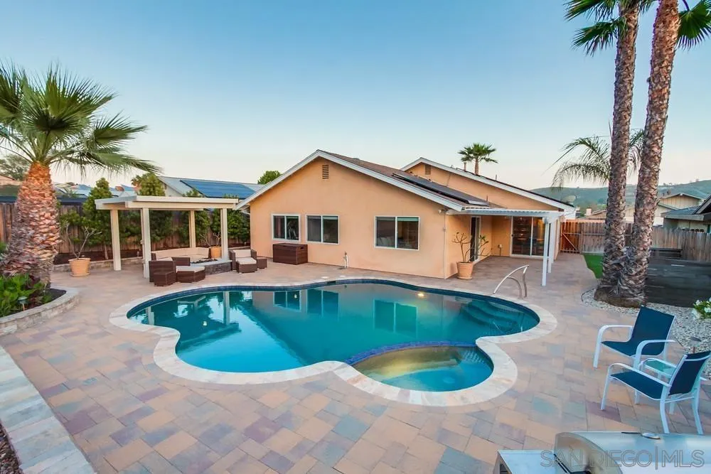 14230 Match Point Drive Poway, CA 92064 - Photo 63 of 70 a view of a house with swimming pool and sitting area