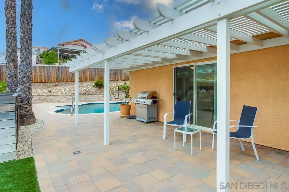 14230 Match Point Drive Poway, CA 92064 - Photo 67 of 70 a view of a patio with table and chairs and potted plants