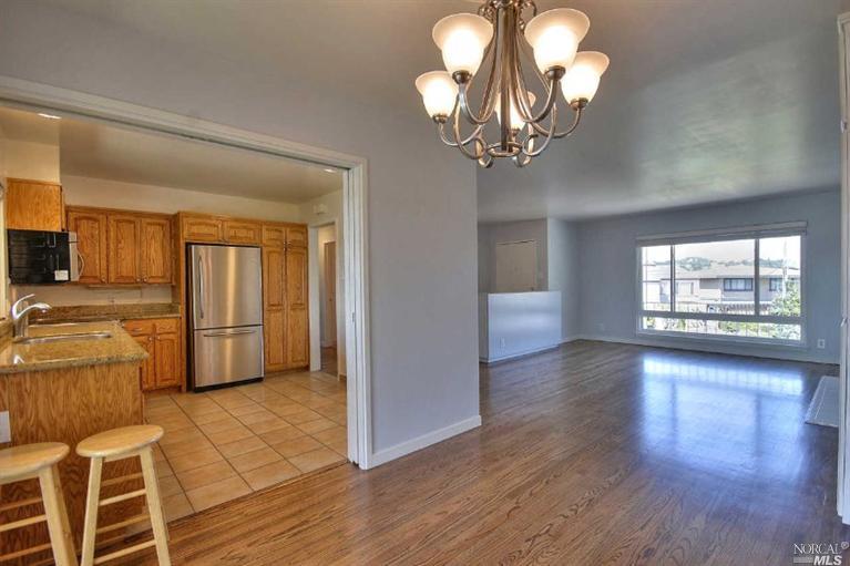 4 Point San Pedro Road, Unit 7 San Rafael, CA 94901 - Photo 1 of 1 a view of a livingroom with furniture wooden floor and windows
