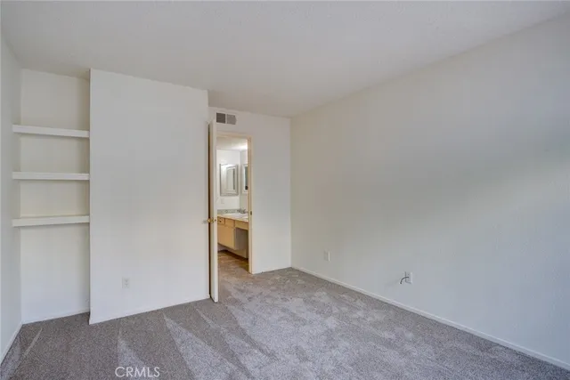 a view of a house with a potted plant