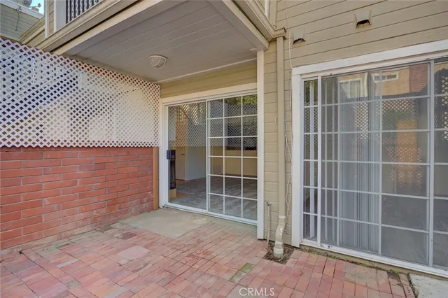 an aerial view of residential building with green space