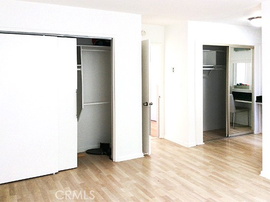 811 6th Street, Unit 305 Santa Monica, CA 90403 - Photo 17 of 25 a view of an empty room with kitchen and a window