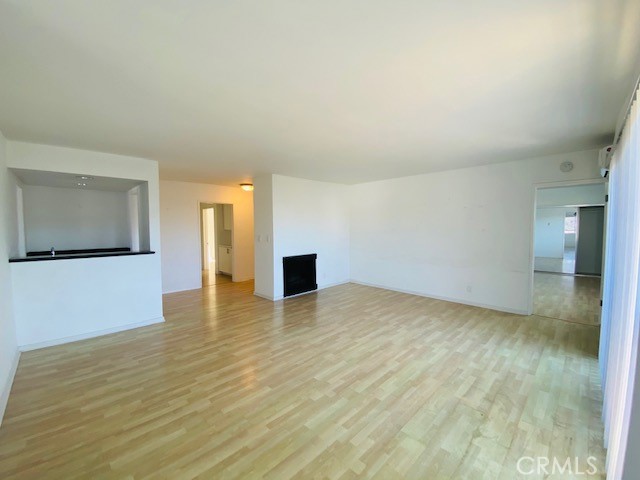 811 6th Street, Unit 305 Santa Monica, CA 90403 - Photo 4 of 25 a view of empty room with wooden floor