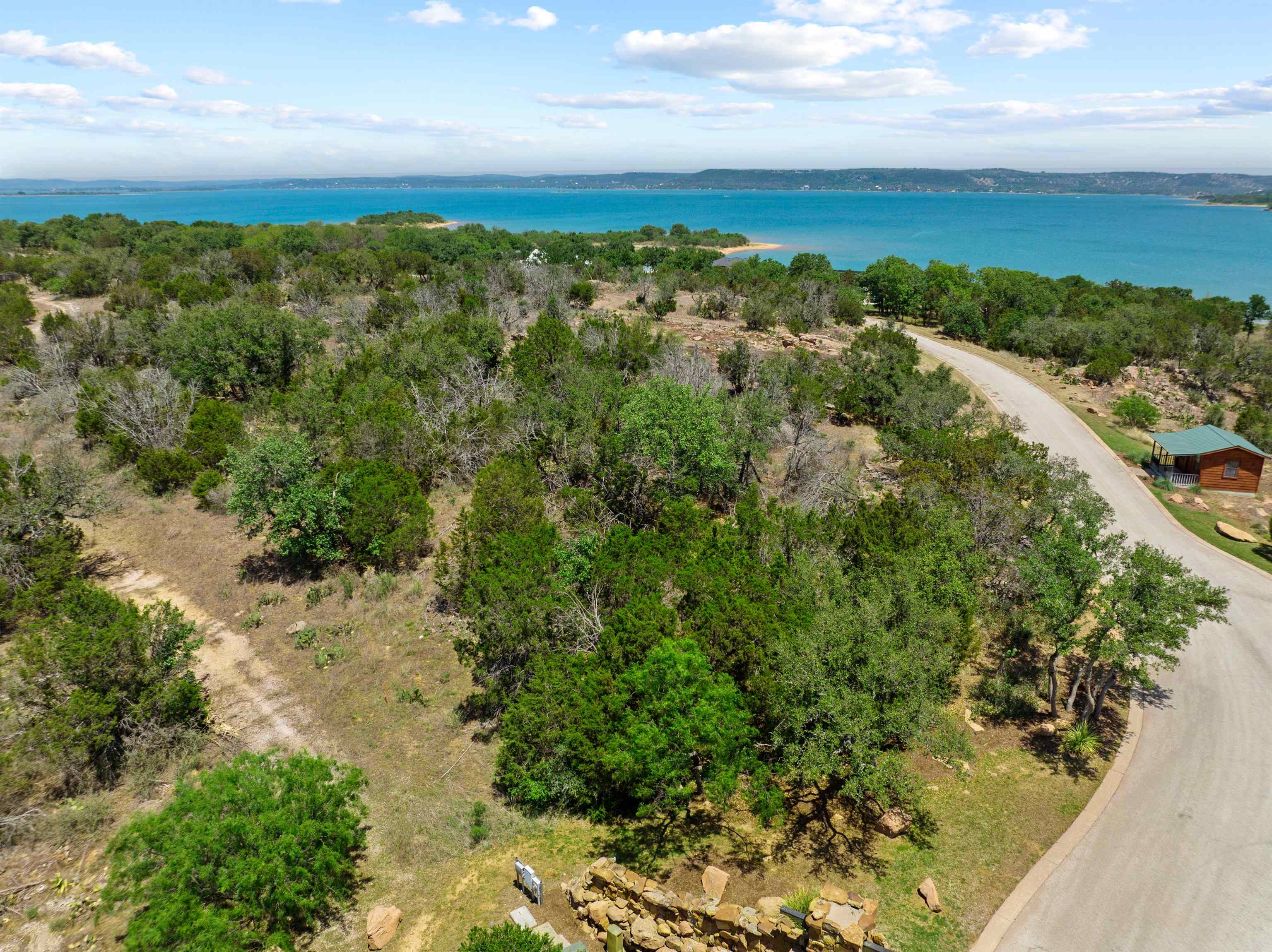 a view of a city with mountains in the background