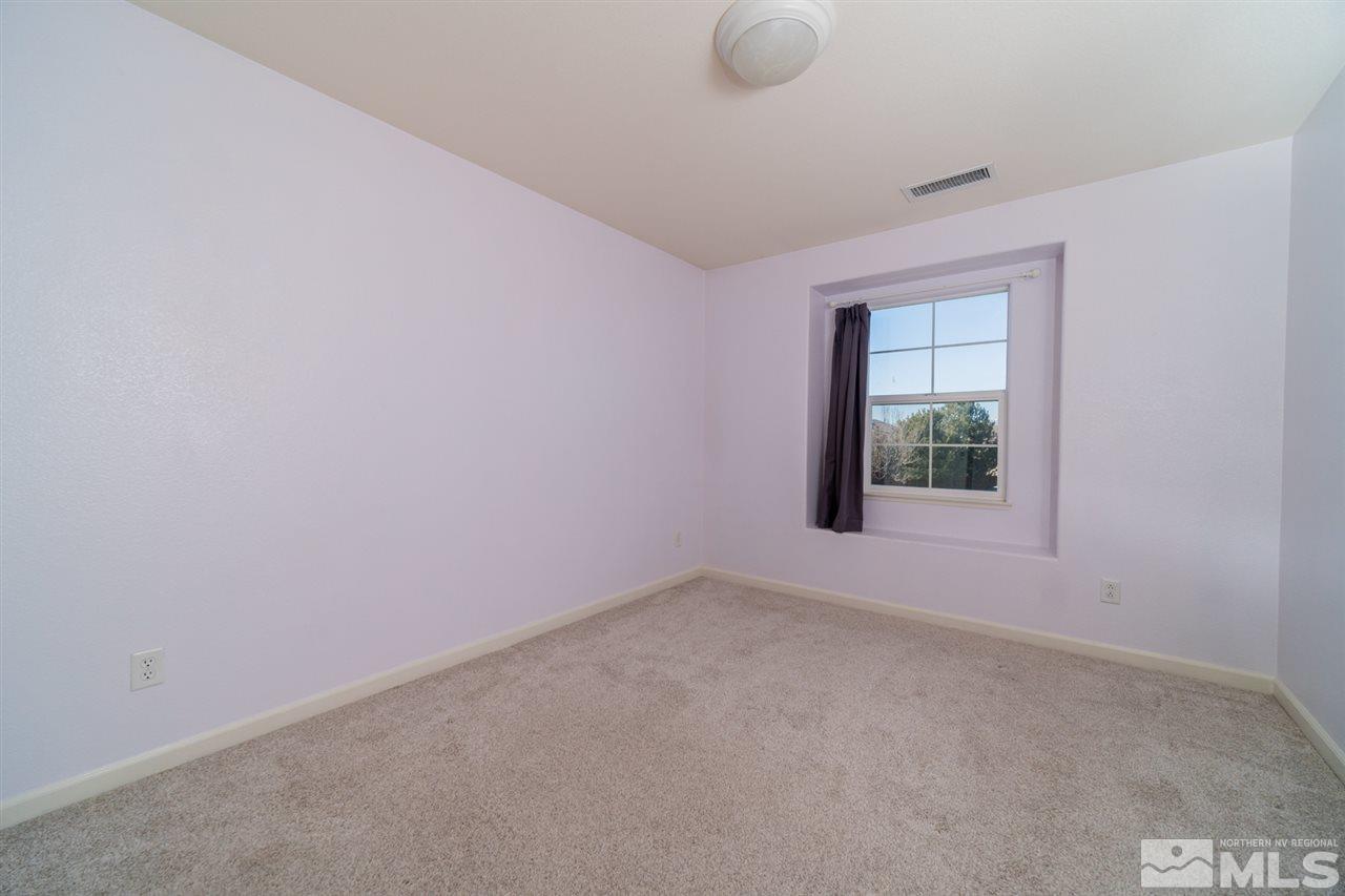 11398 Parma Court Reno, NV 89521 - Photo 19 of 39 an empty room with a window