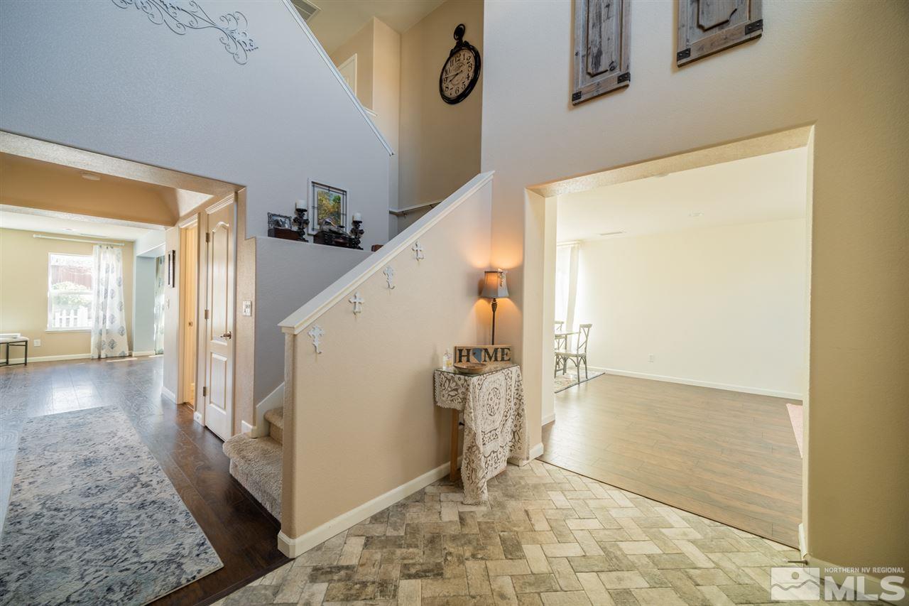 11398 Parma Court Reno, NV 89521 - Photo 2 of 39 a view of a hallway view with staircase