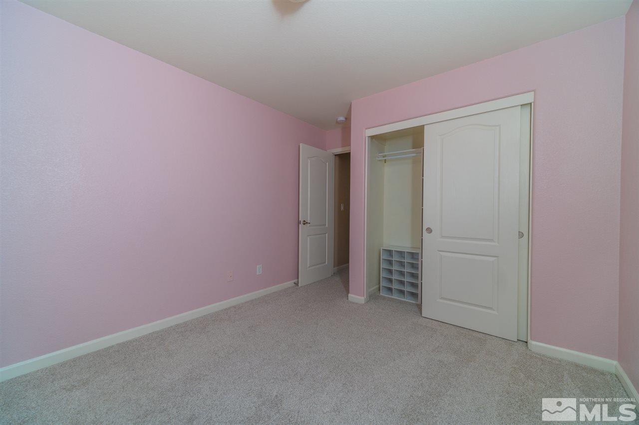 11398 Parma Court Reno, NV 89521 - Photo 23 of 39 an empty room with closet