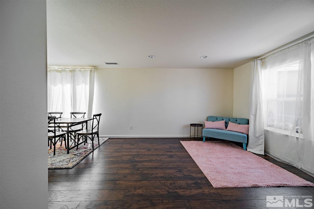 11398 Parma Court Reno, NV 89521 - Photo 3 of 39 a living room with furniture and a table