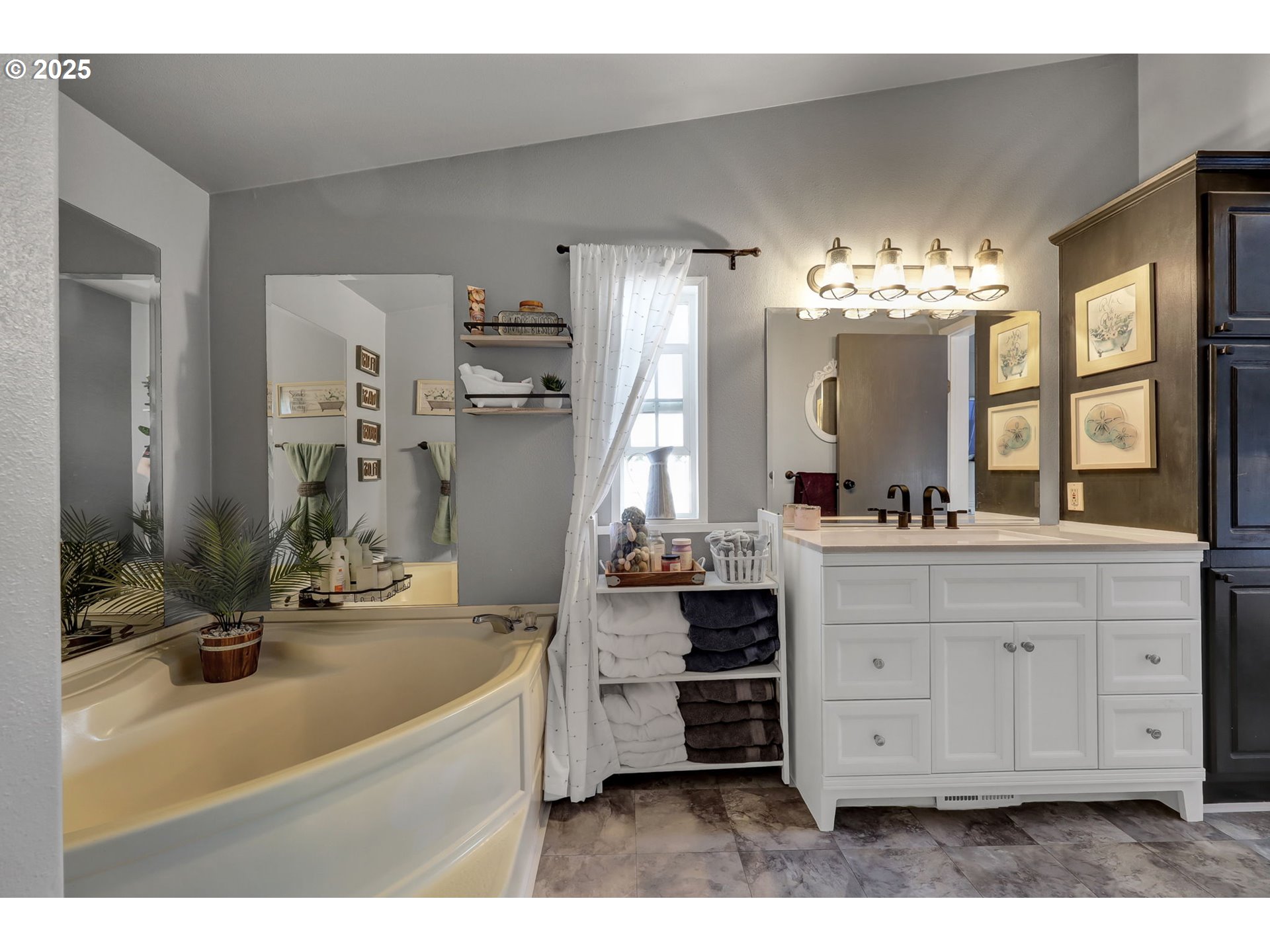 1320 T Street Springfield, OR 97477 - Photo 19 of 34 a bathroom with a sink vanity and mirror