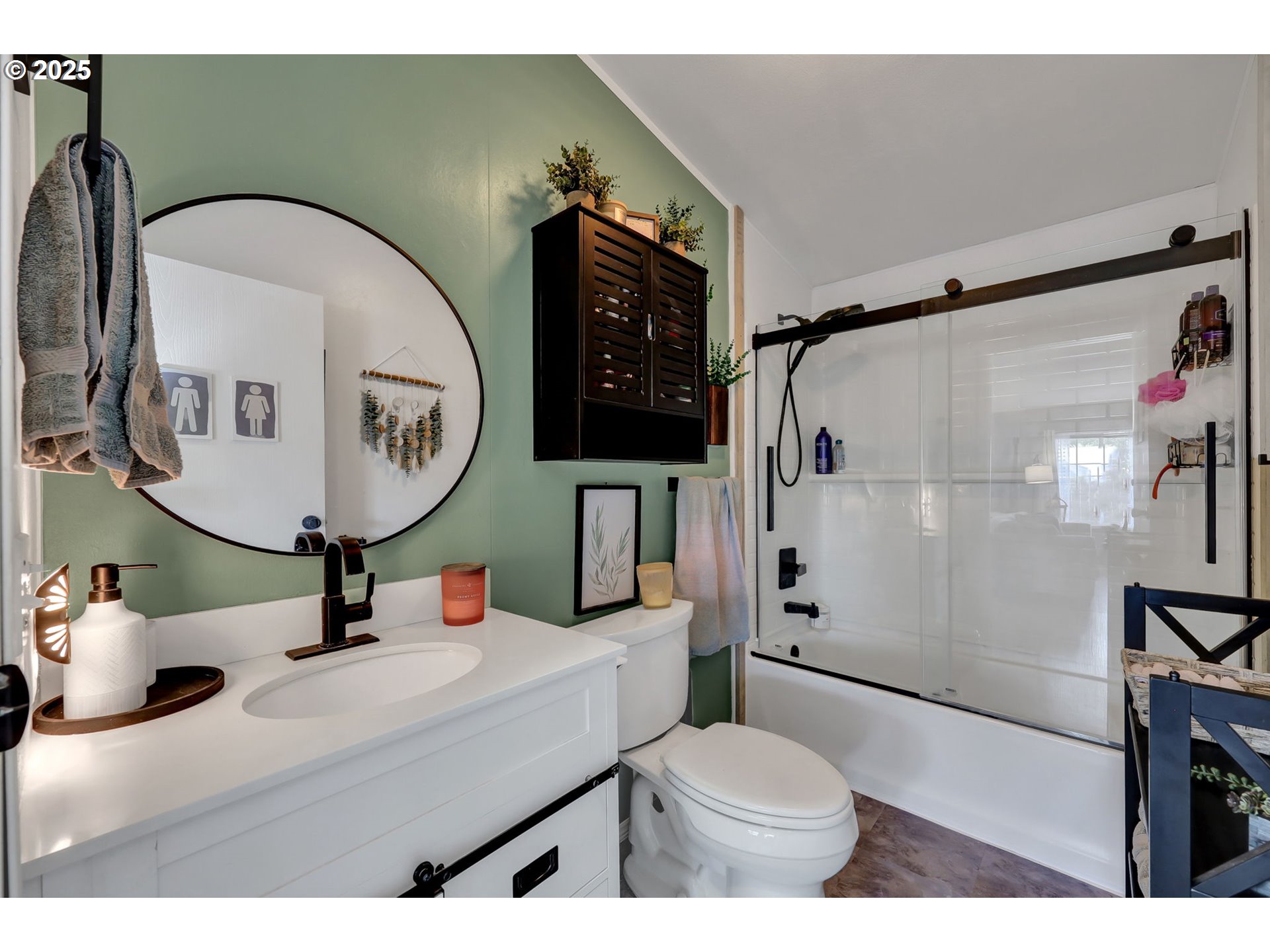 1320 T Street Springfield, OR 97477 - Photo 23 of 34 a bathroom with a sink mirror vanity and toilet