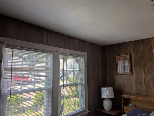 a room with furniture and a window