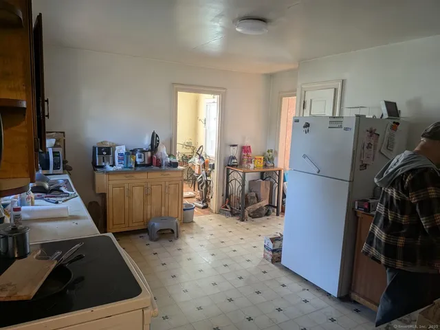 a view of a hallway with entryway