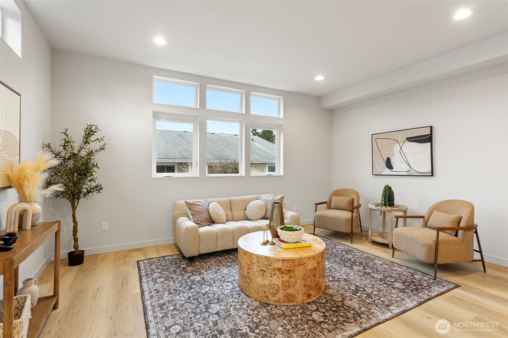 926 Northwest 57th Street, Unit B Seattle, WA 98107 - Photo 11 of 37 a living room with furniture and a potted plant