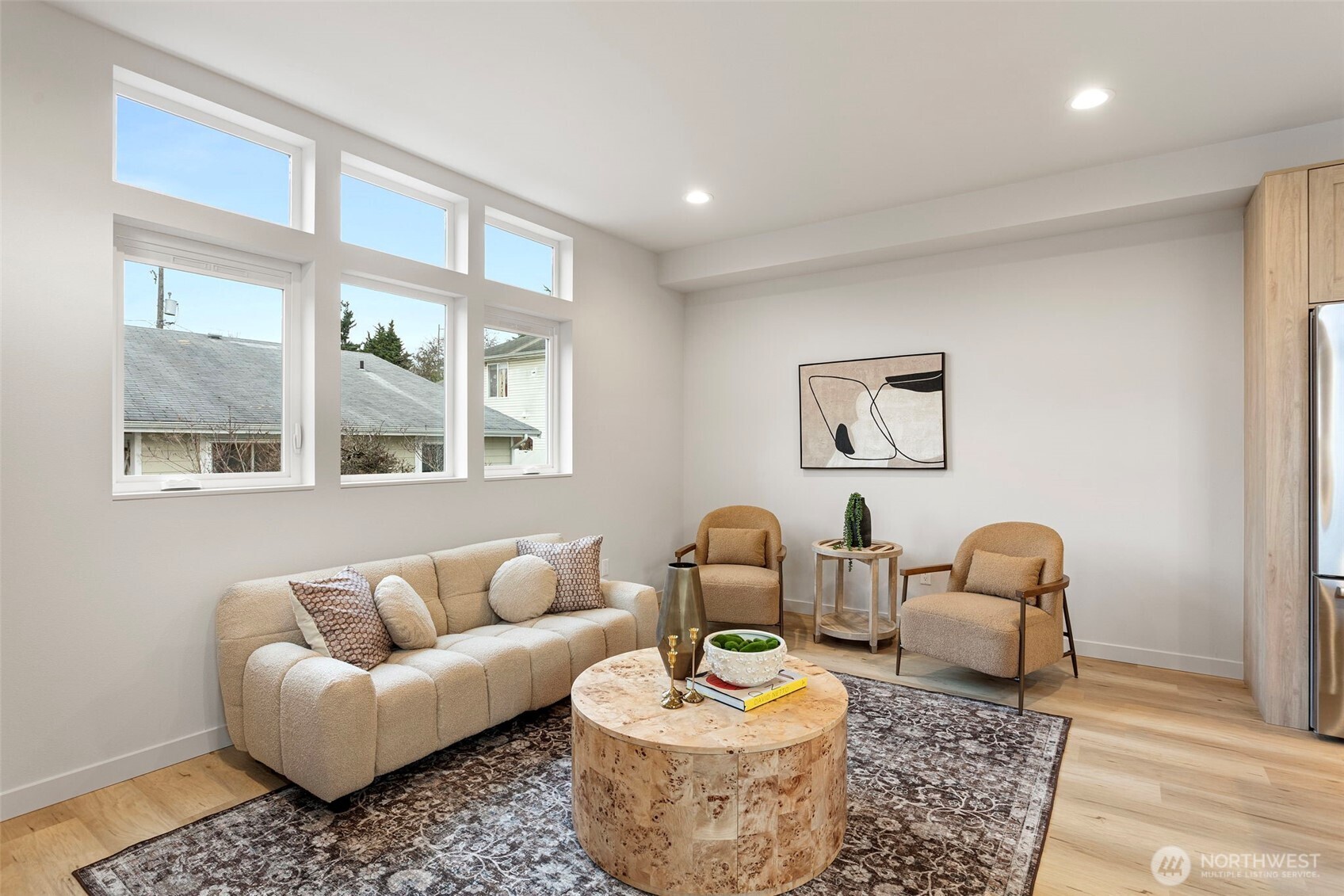 926 Northwest 57th Street, Unit B Seattle, WA 98107 - Photo 12 of 37 a living room with furniture and a window