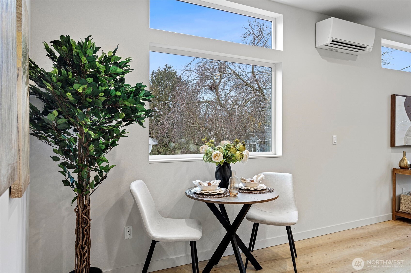 926 Northwest 57th Street, Unit B Seattle, WA 98107 - Photo 23 of 37 a dining room with furniture and window