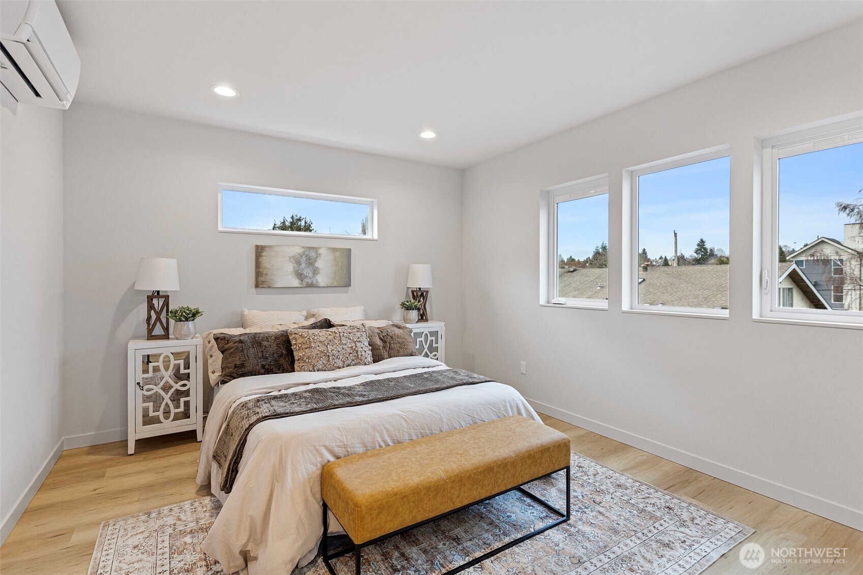 926 Northwest 57th Street, Unit B Seattle, WA 98107 - Photo 26 of 37 a bedroom with a bed and a window