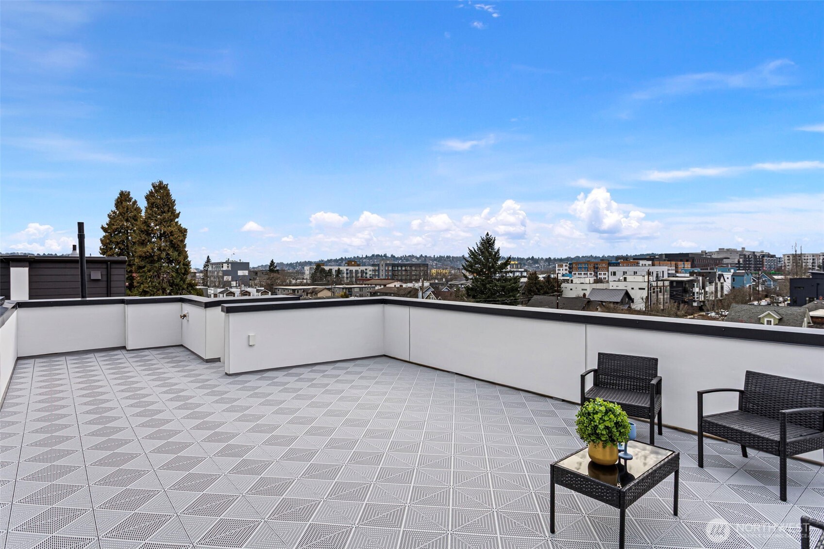 926 Northwest 57th Street, Unit B Seattle, WA 98107 - Photo 32 of 37 a view of a terrace with furniture