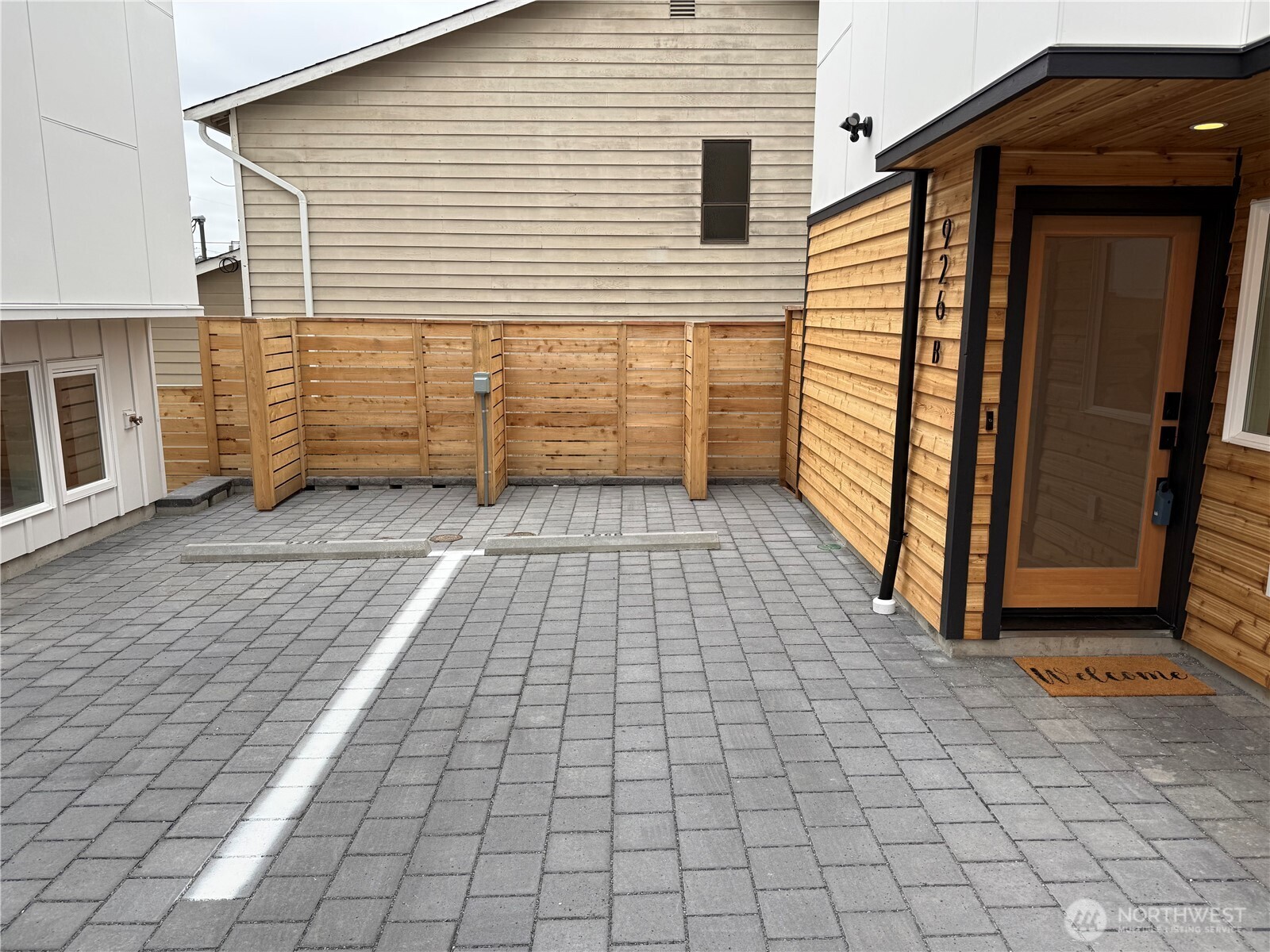926 Northwest 57th Street, Unit B Seattle, WA 98107 - Photo 37 of 37 a view of a house with backyard