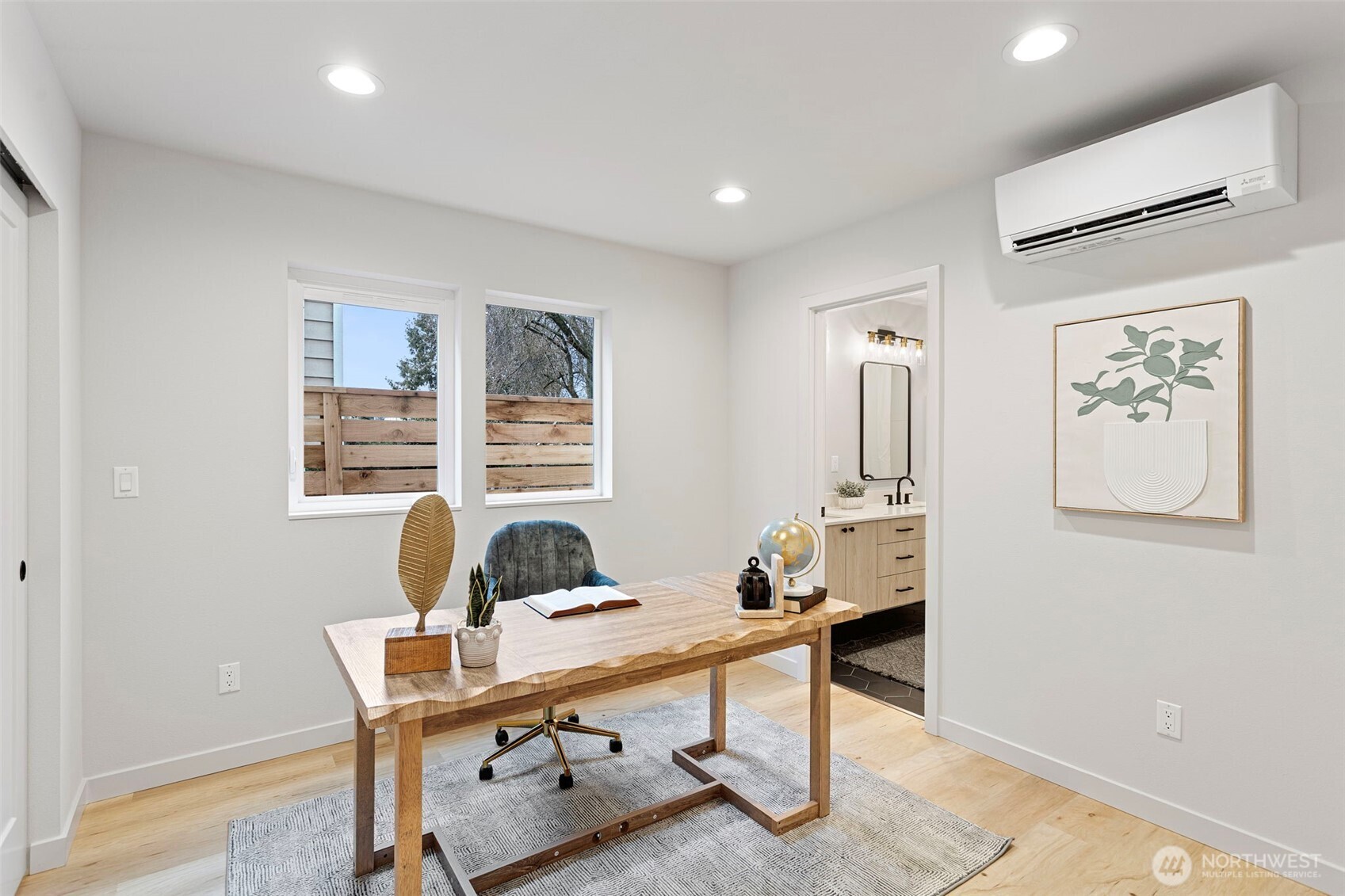 926 Northwest 57th Street, Unit B Seattle, WA 98107 - Photo 6 of 37 a view of a workspace with furniture