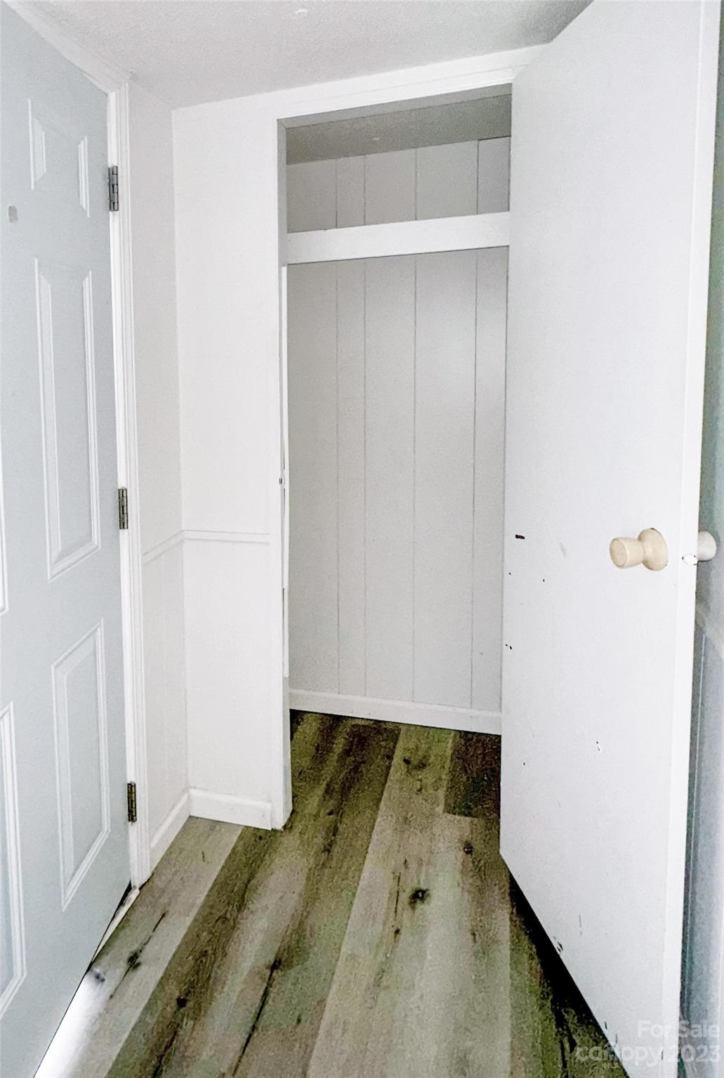 3378 Startown Road Newton, NC 28658 - Photo 14 of 30 a view of walk in closet with wooden floor