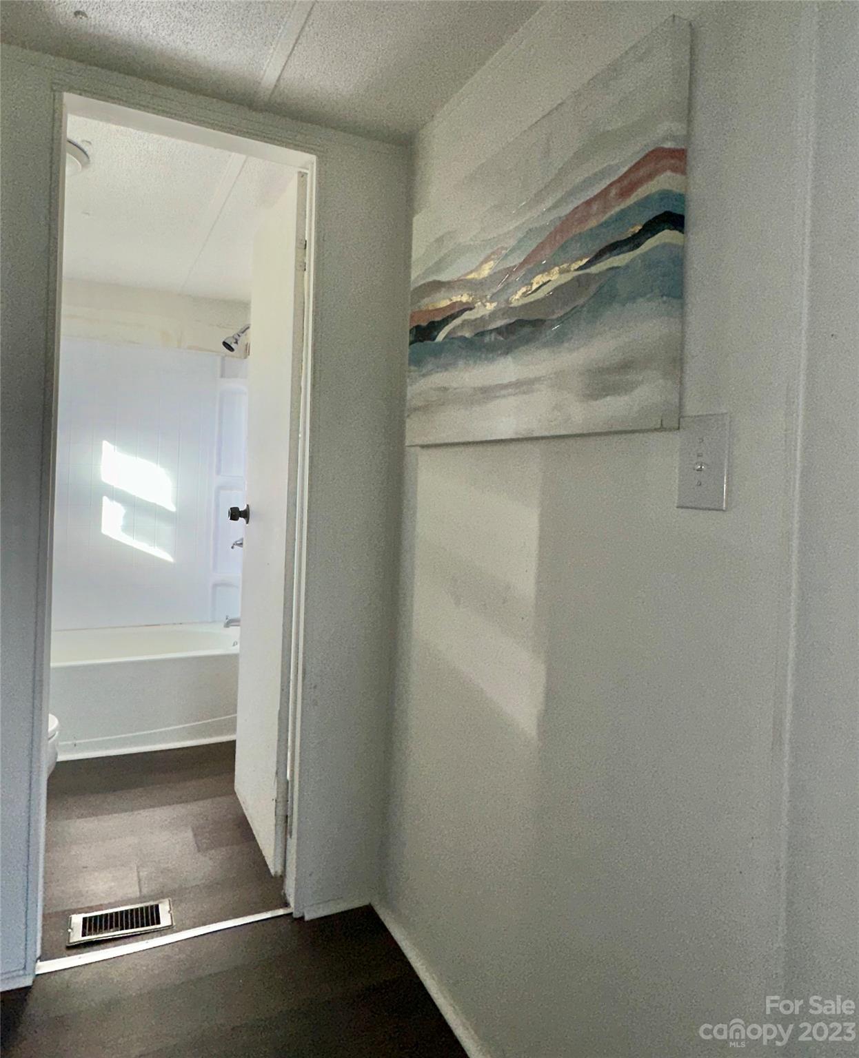 3378 Startown Road Newton, NC 28658 - Photo 16 of 30 a bathroom with a glass shower door