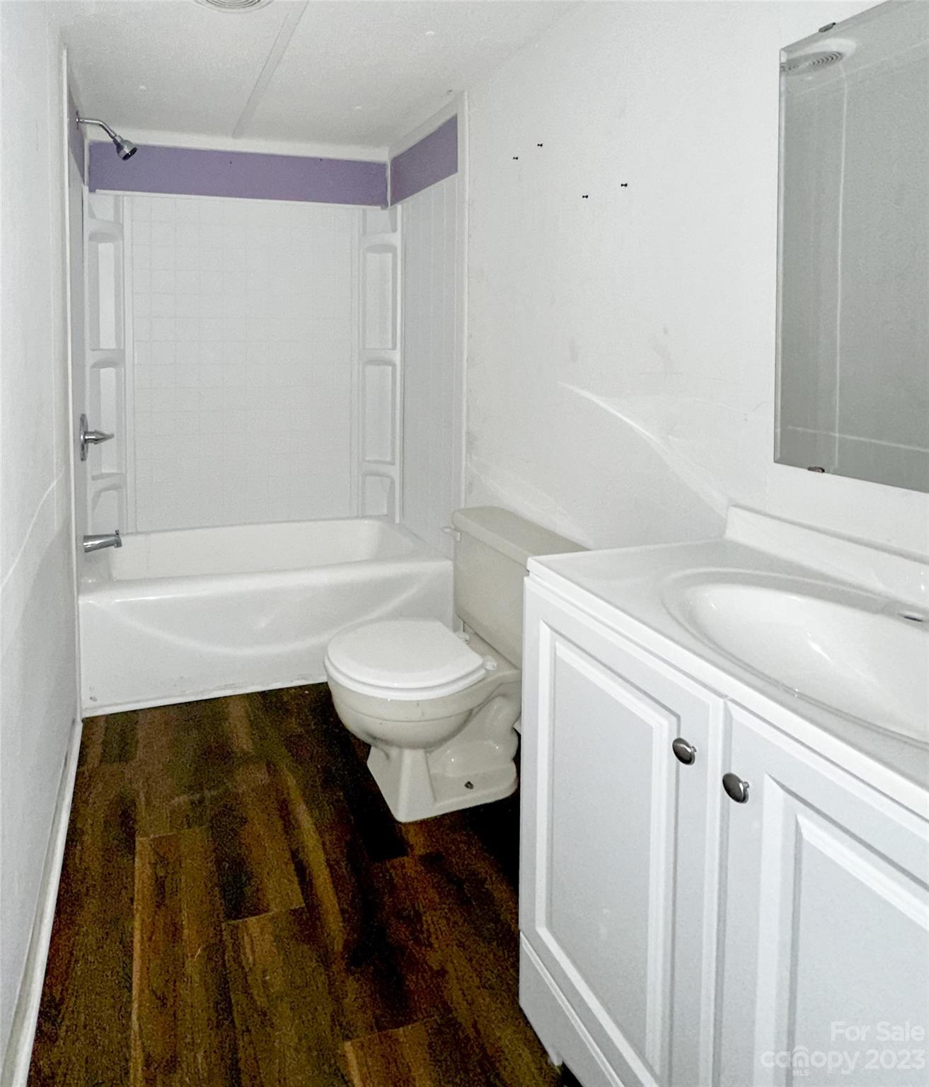 3378 Startown Road Newton, NC 28658 - Photo 17 of 30 a bathroom with a bathtub and a toilet