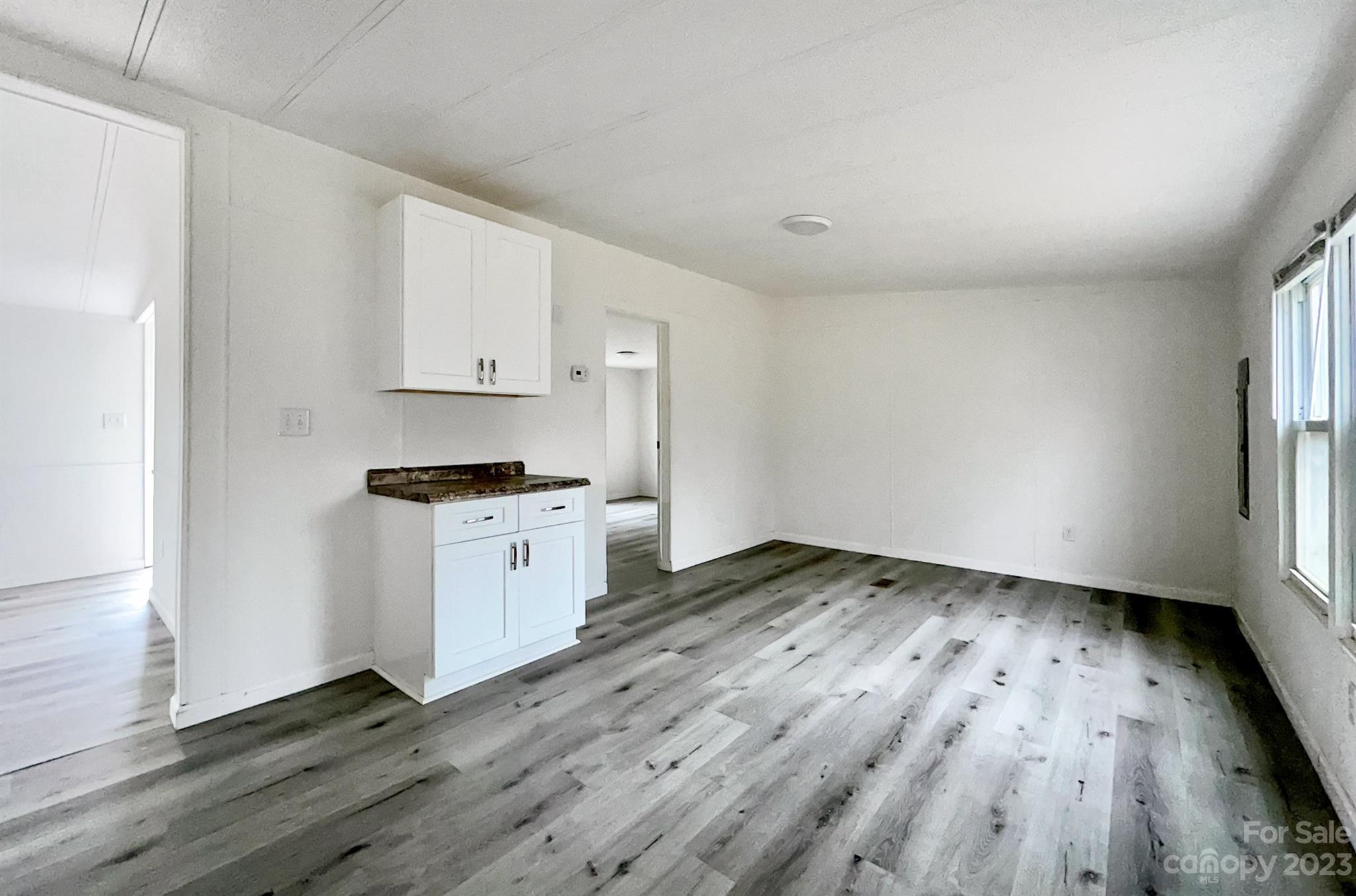3378 Startown Road Newton, NC 28658 - Photo 6 of 30 a view of kitchen with wooden floor and electronic appliances