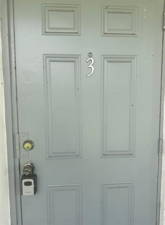 332 Southwest 2nd Place, Unit 3 Pompano Beach, FL 33060 - Photo 11 of 11 a view of a door